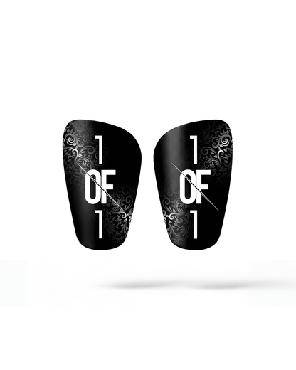 1OF1 mini shin pads lifestyle — player wearing minimal shin protection