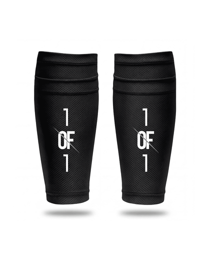 1OF1 shin pad support holder worn on leg — replaces velcro